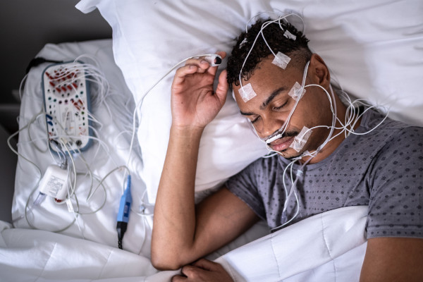 Patient sleeping in a medical clinic doing a medical exam