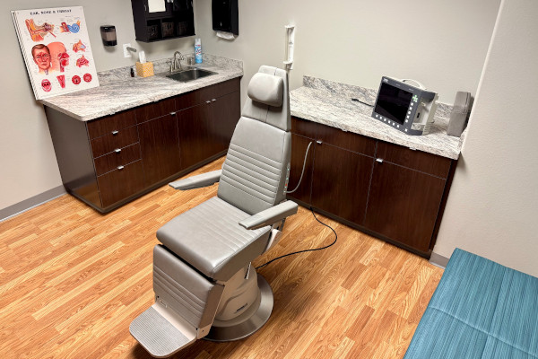 An examination room with an exam chair in Joplin ENT